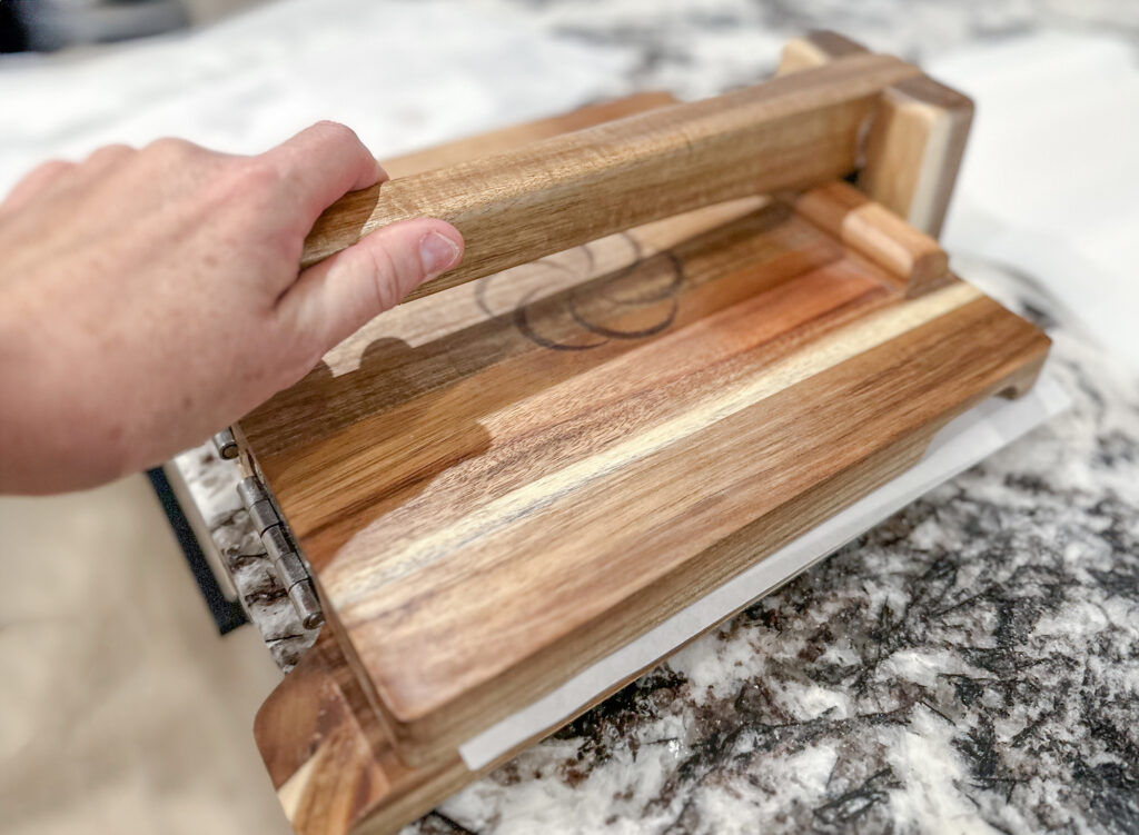 Pressing homemade flour tortillas