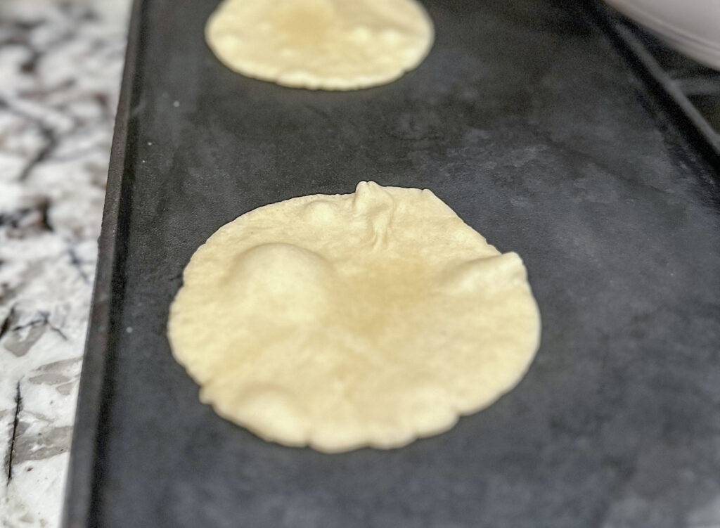 Cooking the best homemade flour tortillas on a griddle