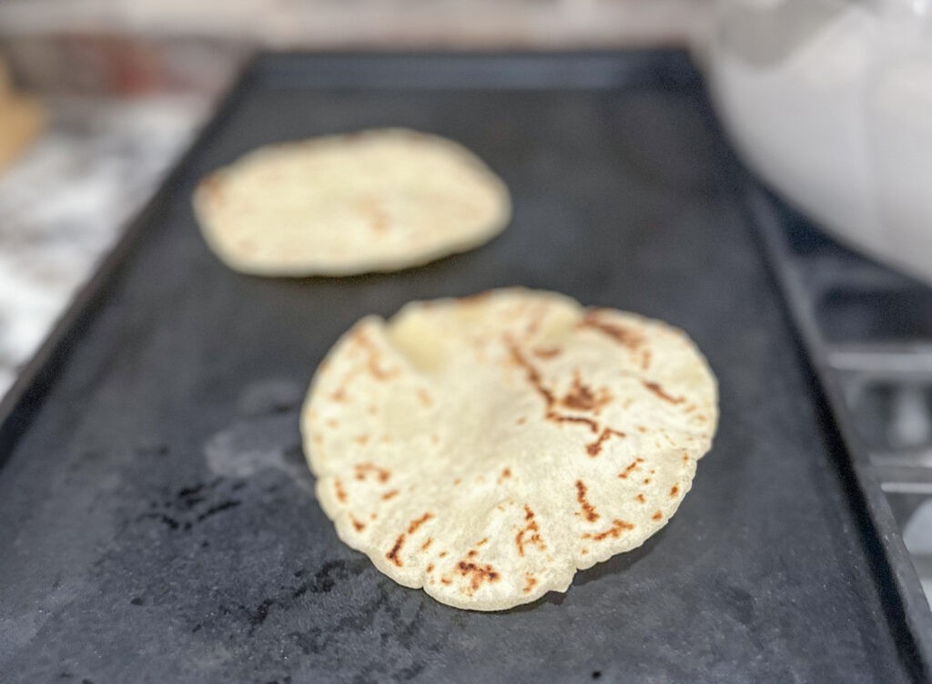 Cooking the tortillas